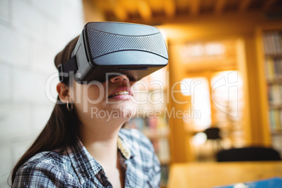 Female student using virtual reality headset