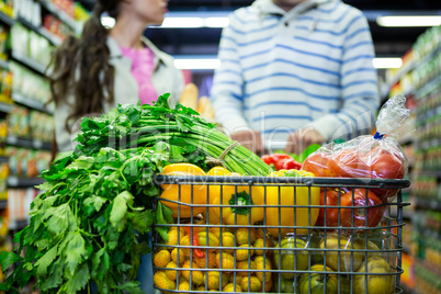 Close-up of various vegetables and fruits in trolley