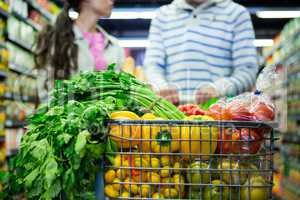 Close-up of various vegetables and fruits in trolley