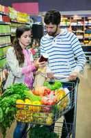 Couple shopping in grocery section