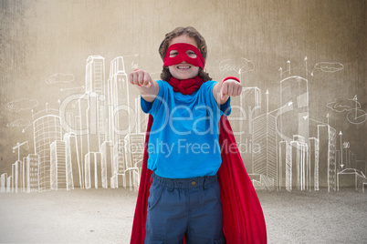 Composite image of boy in superhero costume