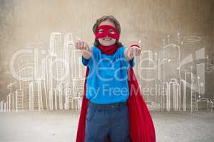 Composite image of boy in superhero costume