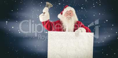 Composite image of santa holds a sign and rings his bell