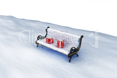 Snow covered bench with gift boxes