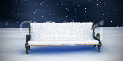 Composite image of snow covered park bench