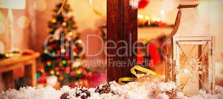 Pine cone decoration on fake snow