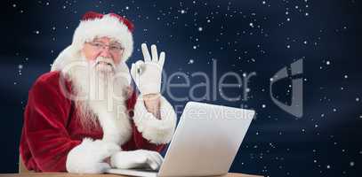 Composite image of santa is satisfied about what he found