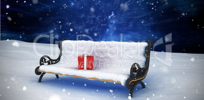 Composite image of digital generated image of gift boxes on park bench