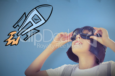 Composite image of cheerful boy with flying goggles