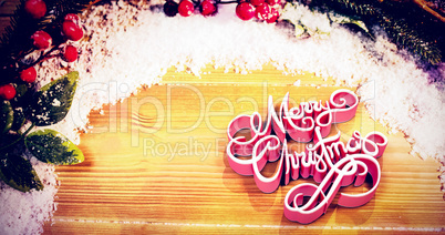 Composite image of high angle view of three dimensional of merry christmas text