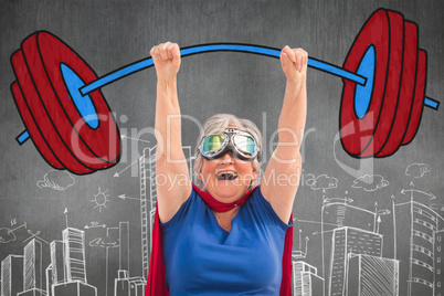 Composite image of senior woman pretending to be a superhero