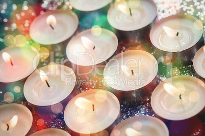 Close-up of candles burning