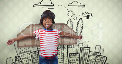 Composite image of smiling boy pretending to be pilot