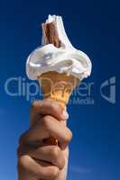 Ice Cream Cone with Chocolate Flake and Blue Sky