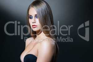 Beauty. Visage model posing with deep neckline