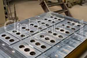Metal molds for production of bricks, close-up