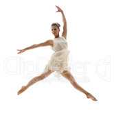 Beautiful ballerina posing in graceful leap