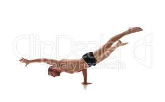 Sport. Studio photo of athlete doing handstand
