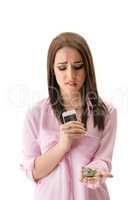 Sad girl think about cost of repair smartphone