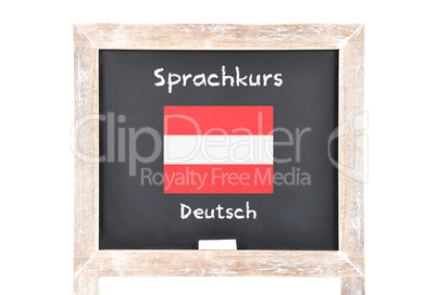 Sprachkurs mit Flagge auf Tafel