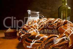 Braided roll with poppy seeds and cinnamon