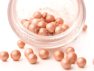 Make up pearls on a bright table