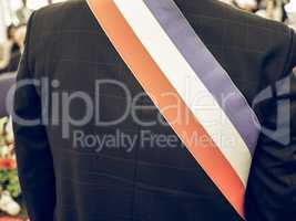 Vintage looking French mayor with sash