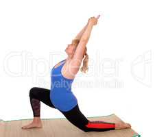 Yoga trainer showing stretching.
