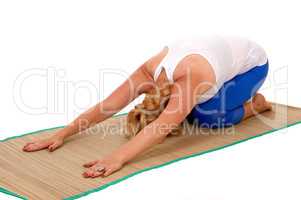 Yoga trainer kneeling on stomach.