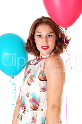 Young woman with two balloons.