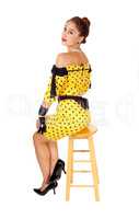 Lovely woman sitting on chair.