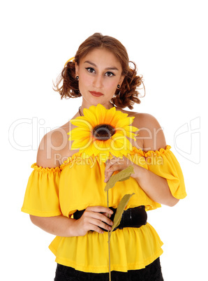 Portrait of woman with sunflowers.