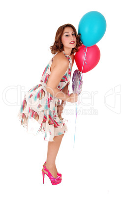 Lovely woman with two balloons.
