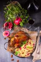 Duck with millet and pomegranate