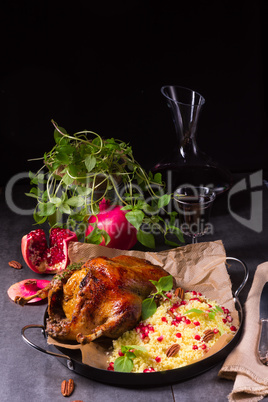 Duck with millet and pomegranate