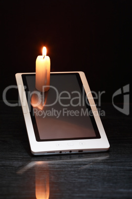Candle On Tablet