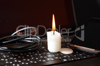Candle On Laptop