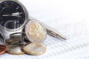 Coins Near Wristwatch
