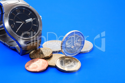 Coins Near Watch