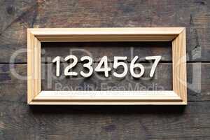 Wooden Digits In Frame