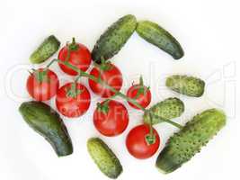 cucumbers and tomatoes isolated on the white
