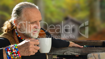 Elderly man drinking coffee