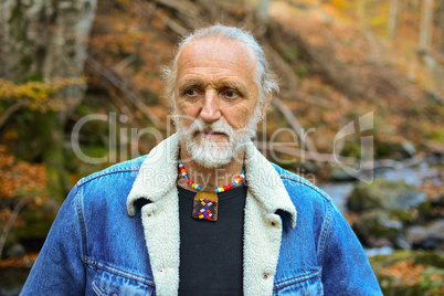Autumn portrait of old man