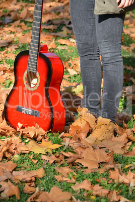 Standing in autumn park