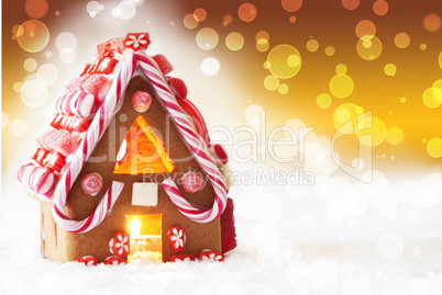 Gingerbread House, Golden Background With Bokeh, Copy Space Gingerbread House, Golden Background With Bokeh, Copy Space