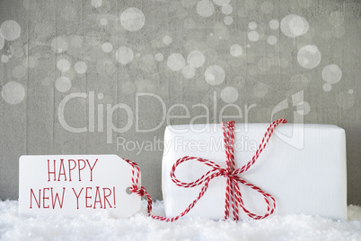 Gift, Cement Background With Bokeh, Text Happy New Year