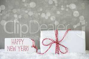 Gift, Cement Background With Bokeh, Text Happy New Year