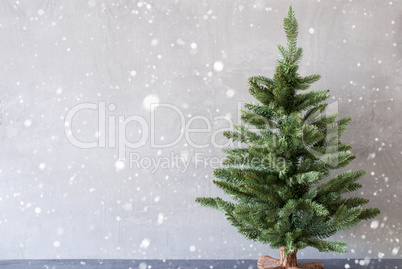 Christmas Tree With Cement Wall As Background, Snowflakes, Copy Space