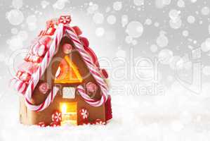 Gingerbread House, Silver Background With Bokeh And Snowflakes, Copy Space