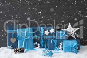 Blue Gifts With Christmas Decoration, Black Cement Wall, Snow, Snowflakes